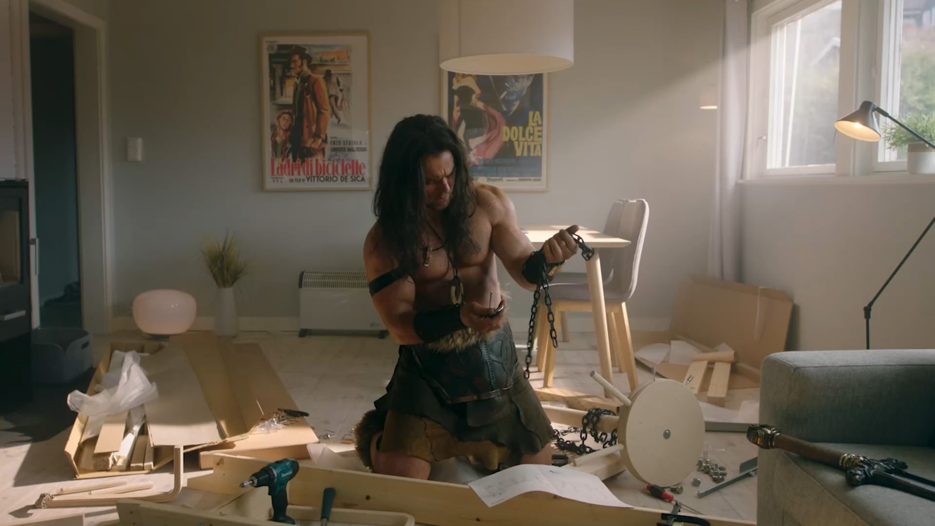 A real-life Conan the Barbarian attempting to assemble an IKEA torture device